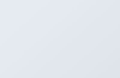 A light gray smooth surface with subtle diagonal lines and a soft gradient, creating a minimalist and clean background.